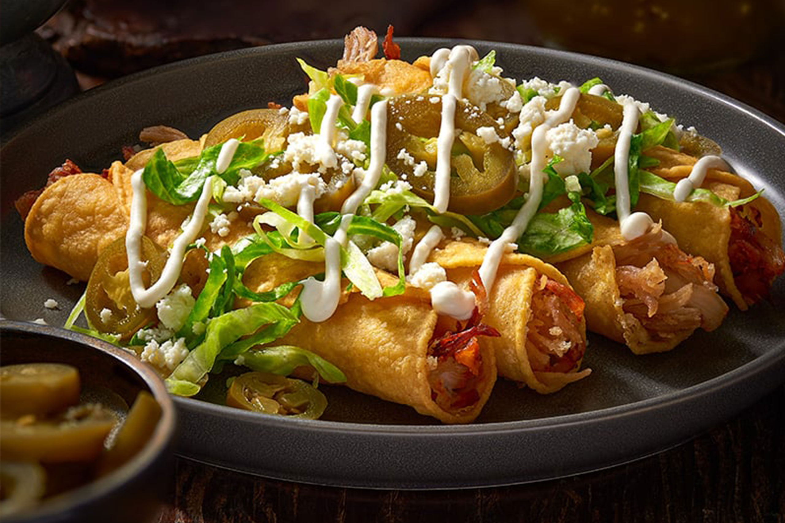 Deep-Fried Chicken Flautas with Refried Beans and Green Salsa